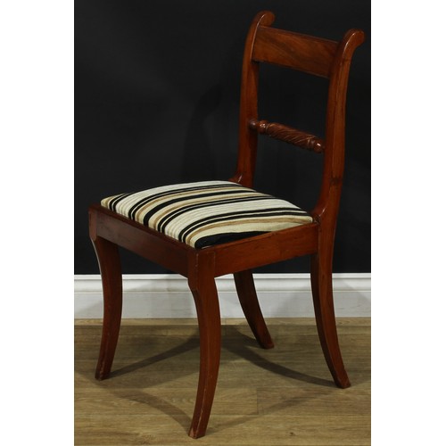 1120 - A set of five Regency mahogany rope-twist dining chairs, comprising four side chairs and a carver, t... 