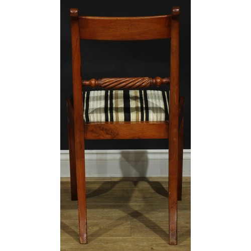 1120 - A set of five Regency mahogany rope-twist dining chairs, comprising four side chairs and a carver, t... 