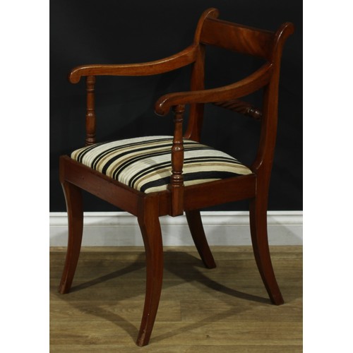 1120 - A set of five Regency mahogany rope-twist dining chairs, comprising four side chairs and a carver, t... 