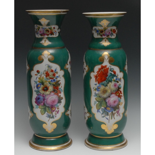 526A - A pair of 19th century French Sevres style flared cylindrical vases, each gilded and painted with pa... 