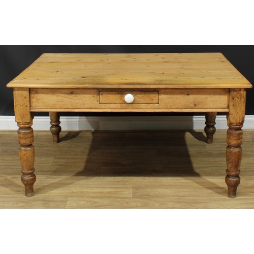 1340 - A late Victorian pine servants' quarters dining table, rectangular top above a single frieze drawer,... 