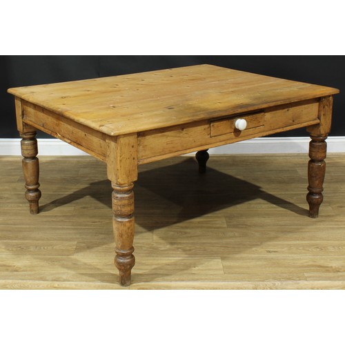 1340 - A late Victorian pine servants' quarters dining table, rectangular top above a single frieze drawer,... 