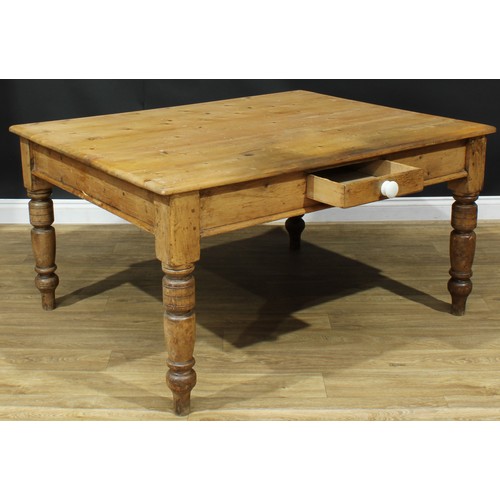 1340 - A late Victorian pine servants' quarters dining table, rectangular top above a single frieze drawer,... 