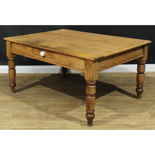 1340 - A late Victorian pine servants' quarters dining table, rectangular top above a single frieze drawer,... 