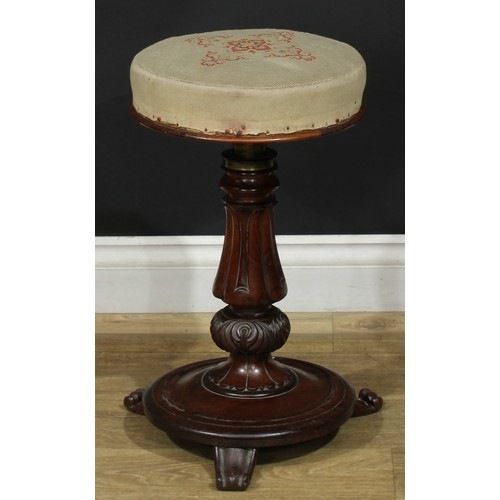 1412 - A pair of William IV rosewood height-adjustable piano stools, each with stuffed-over seat, lotus col... 