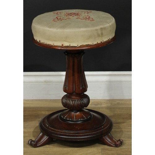 1412 - A pair of William IV rosewood height-adjustable piano stools, each with stuffed-over seat, lotus col... 