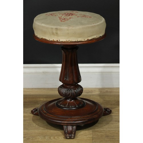 1412 - A pair of William IV rosewood height-adjustable piano stools, each with stuffed-over seat, lotus col... 