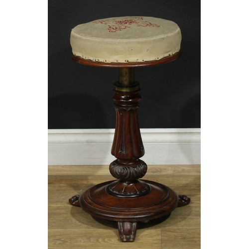 1412 - A pair of William IV rosewood height-adjustable piano stools, each with stuffed-over seat, lotus col... 