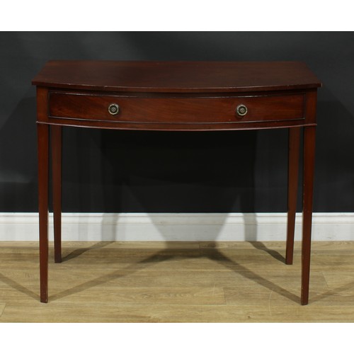 1105 - A George III mahogany bowfront side table, slightly oversailing top above a long cockbeaded frieze d... 