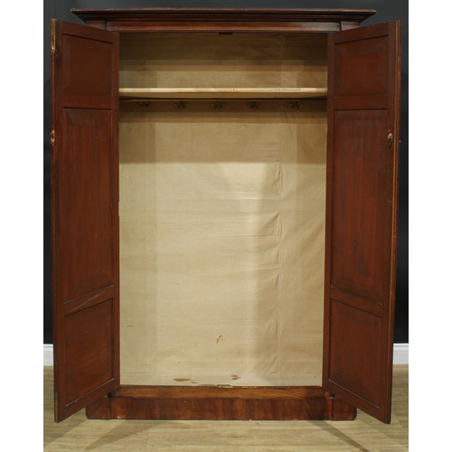 1239 - A George III mahogany wardrobe, possibly Channel Islands, moulded cornice above a pair of panel door... 