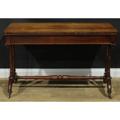 1275 - A George/William IV rosewood library table, rounded rectangular top above a long frieze drawer, turn... 