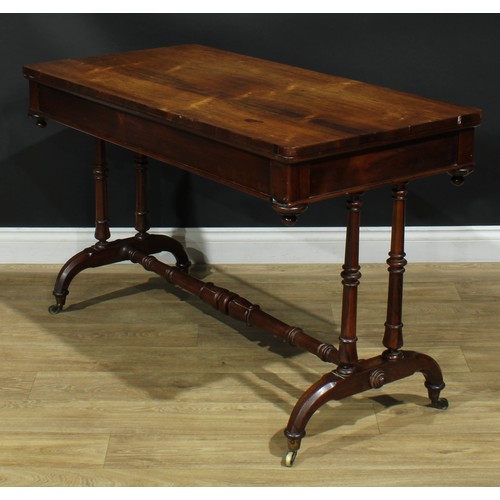 1275 - A George/William IV rosewood library table, rounded rectangular top above a long frieze drawer, turn... 