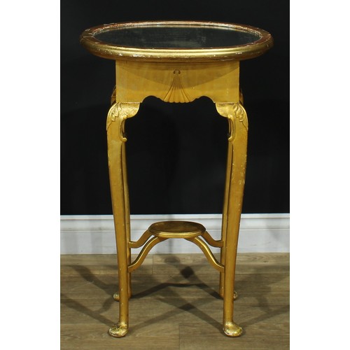 1094 - A George II Revival giltwood occasional table, oval top with mirror plateau, shaped apron, straighte... 