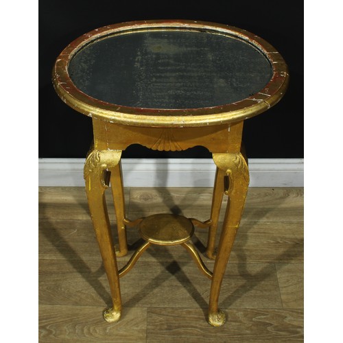 1094 - A George II Revival giltwood occasional table, oval top with mirror plateau, shaped apron, straighte... 