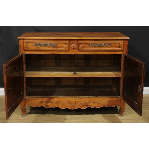 1055 - A French cherry enfilade or buffet serving sideboard, rectangular top with moulded edge above a pair... 