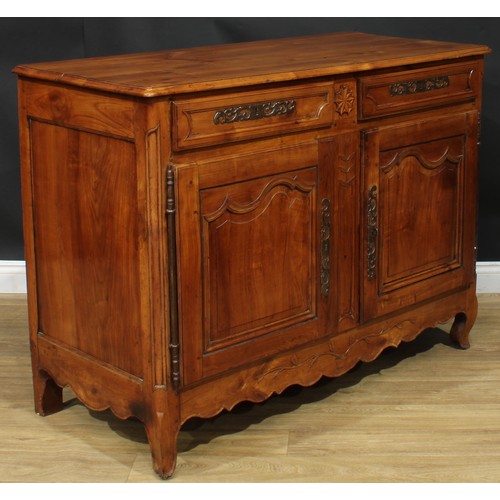 1055 - A French cherry enfilade or buffet serving sideboard, rectangular top with moulded edge above a pair... 