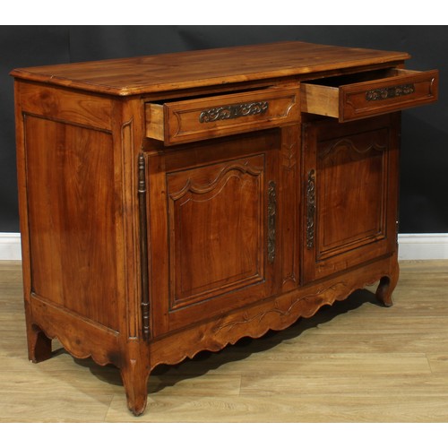 1055 - A French cherry enfilade or buffet serving sideboard, rectangular top with moulded edge above a pair... 