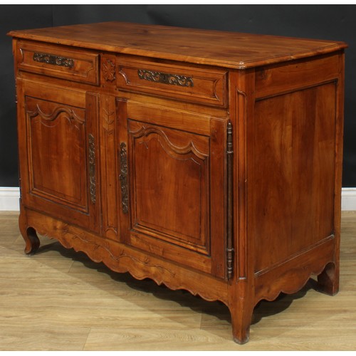 1055 - A French cherry enfilade or buffet serving sideboard, rectangular top with moulded edge above a pair... 