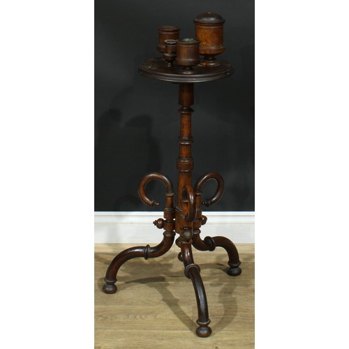 947 - A 19th century oak smoking stand, circular plateau with turned vessels, turned column, downswept leg... 