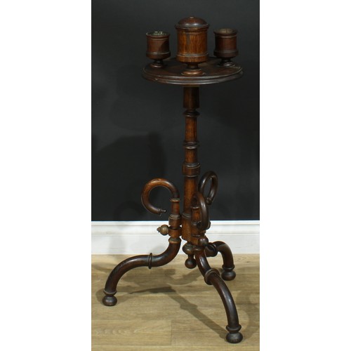 947 - A 19th century oak smoking stand, circular plateau with turned vessels, turned column, downswept leg... 