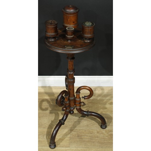 947 - A 19th century oak smoking stand, circular plateau with turned vessels, turned column, downswept leg... 