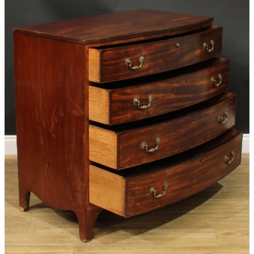 1422 - A Regency mahogany bowfront chest, slightly oversailing top with reeded edge above four long graduat... 