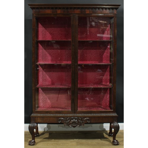 1282 - A large Chippendale Revival mahogany display cabinet, Greek key cornice above a flame veneered friez... 