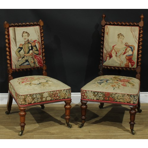 1366 - A near pair of early Victorian rosewood drawing room chairs, each with a needlework back with spiral... 