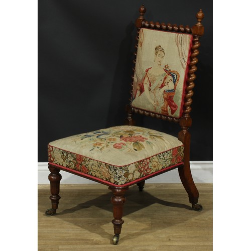 1366 - A near pair of early Victorian rosewood drawing room chairs, each with a needlework back with spiral... 