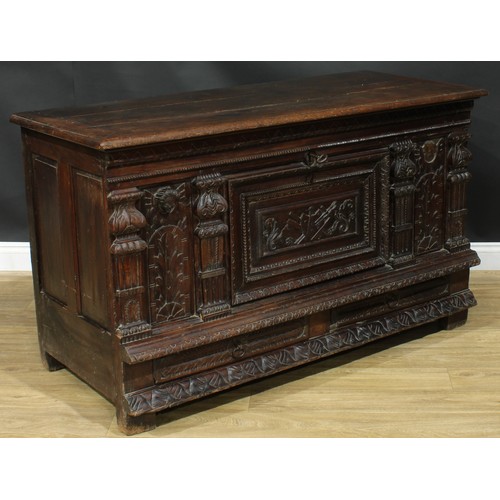 1294 - A late 17th/early 18th century Continental oak mule chest, hinged top enclosing a till, the front ca... 