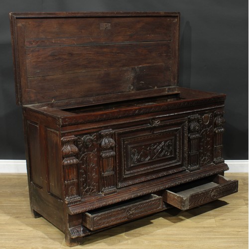 1294 - A late 17th/early 18th century Continental oak mule chest, hinged top enclosing a till, the front ca... 