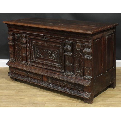 1294 - A late 17th/early 18th century Continental oak mule chest, hinged top enclosing a till, the front ca... 