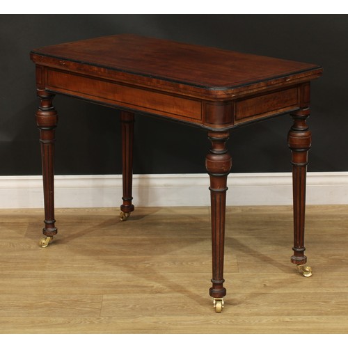 950 - A 19th century parcel-ebonised mahogany card table, hinged top enclosing a baize lined playing surfa... 