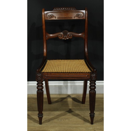 1127 - A set of six Post-Regency George IV rosewood bar-back dining chairs, each with a curved gadroon-capp... 