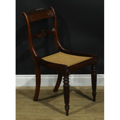 1127 - A set of six Post-Regency George IV rosewood bar-back dining chairs, each with a curved gadroon-capp... 