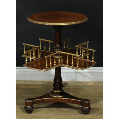 952 - A 19th century parcel-gilt walnut revolving-centre occasional library table, circular top above a re... 