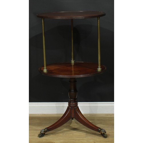 1435 - A Regency mahogany two-tier dumbwaiter, circular plateaux with reeded edge, brass columnar supports,... 