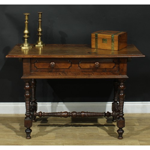 1296 - A late 18th century Spanish walnut side table, oversailing rectangular top with moulded edge above a... 