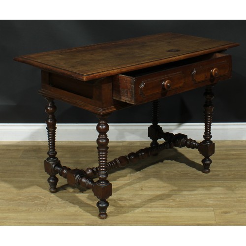 1296 - A late 18th century Spanish walnut side table, oversailing rectangular top with moulded edge above a... 