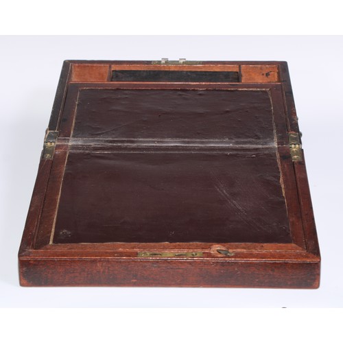 1252 - A George III mahogany travelling writing box, hinged cover enclosing a writing slope and stationery ... 