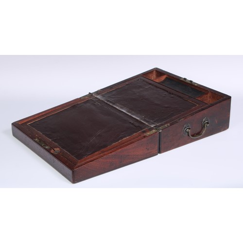 1252 - A George III mahogany travelling writing box, hinged cover enclosing a writing slope and stationery ... 