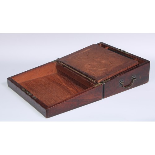 1252 - A George III mahogany travelling writing box, hinged cover enclosing a writing slope and stationery ... 