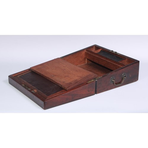 1252 - A George III mahogany travelling writing box, hinged cover enclosing a writing slope and stationery ... 