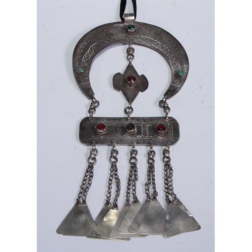 341 - A Bedouin silver coloured metal necklace, the central rectangular tablet suspended from a crescent, ... 