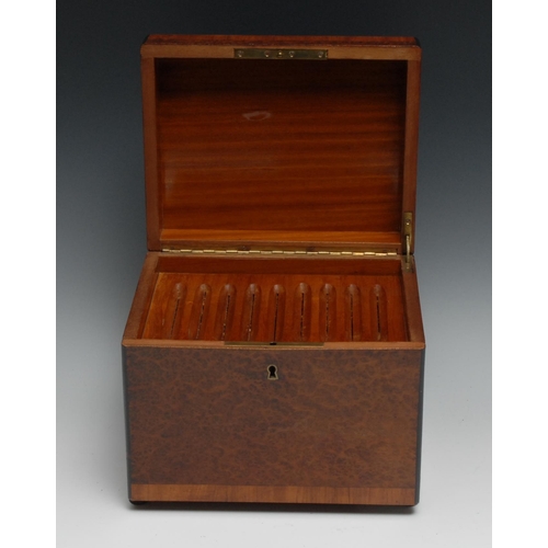 1246 - A Continental crossbanded amboyna cigar humidor, hinged cover and fall front enclosing four sliding ... 