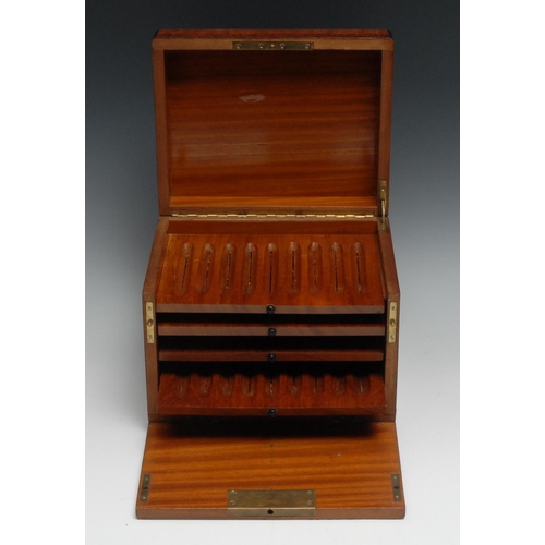 1246 - A Continental crossbanded amboyna cigar humidor, hinged cover and fall front enclosing four sliding ... 