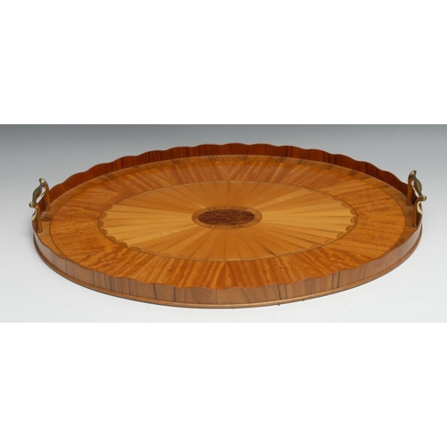 1205 - A Sheraton Revival rosewood crossbanded satinwood oval gallery tray, wavy border, the field inlaid w... 