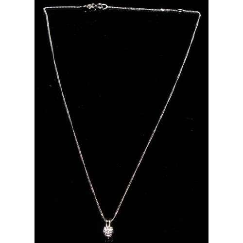 343 - A 9ct white gold diamond solitaire pendant necklace, the stone approx. 0.4ct, the necklace chain mar... 