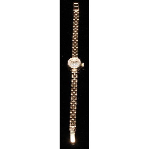 327 - A 9ct gold lady's Omega cocktail wristwatch, silvered dial, baton markers, articulated strap, 16g gr... 