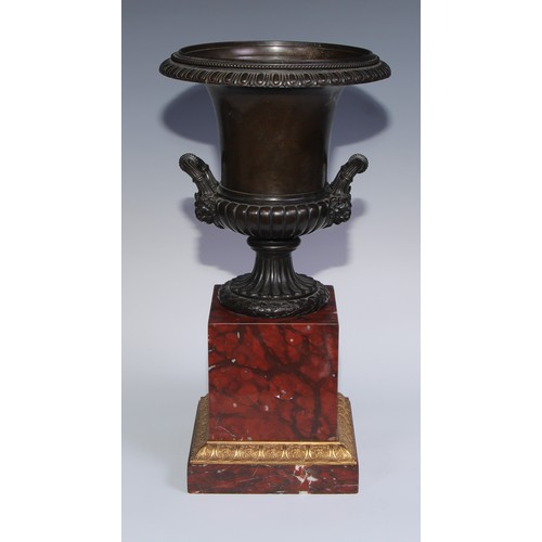 1267 - A pair of 19th century brown patinated bronze half-fluted campana urns, everted egg-and-dart rims, w... 